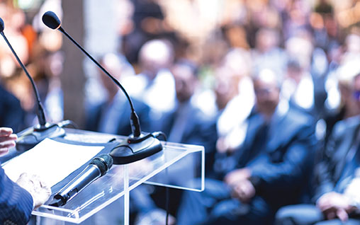 Speaker at business conference